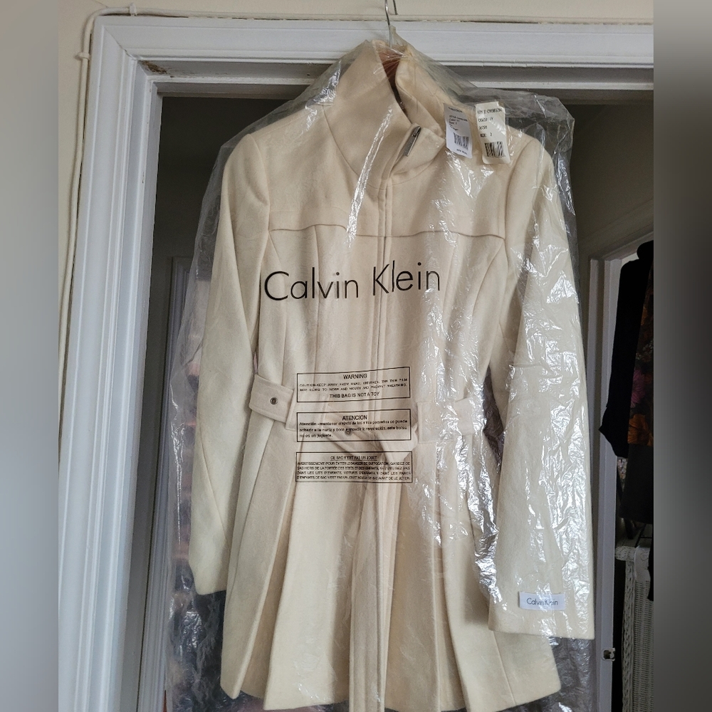 Beautiful, soft, ivory colored Calvin Klein wool coat with belt!